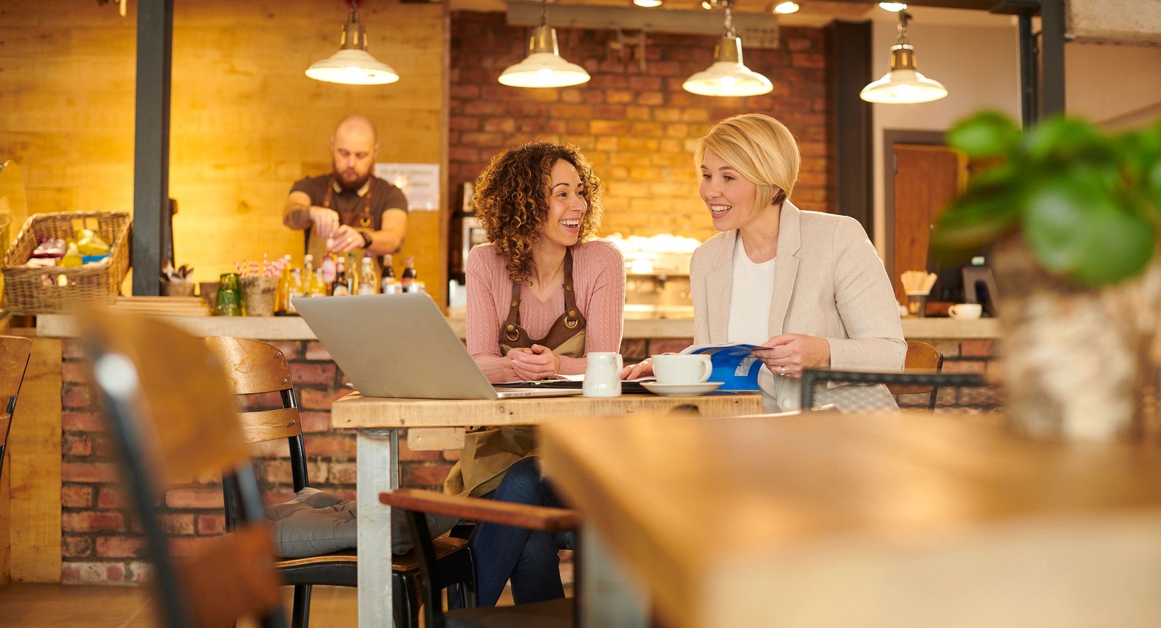 Business owner receiving professional advice in a local business setting