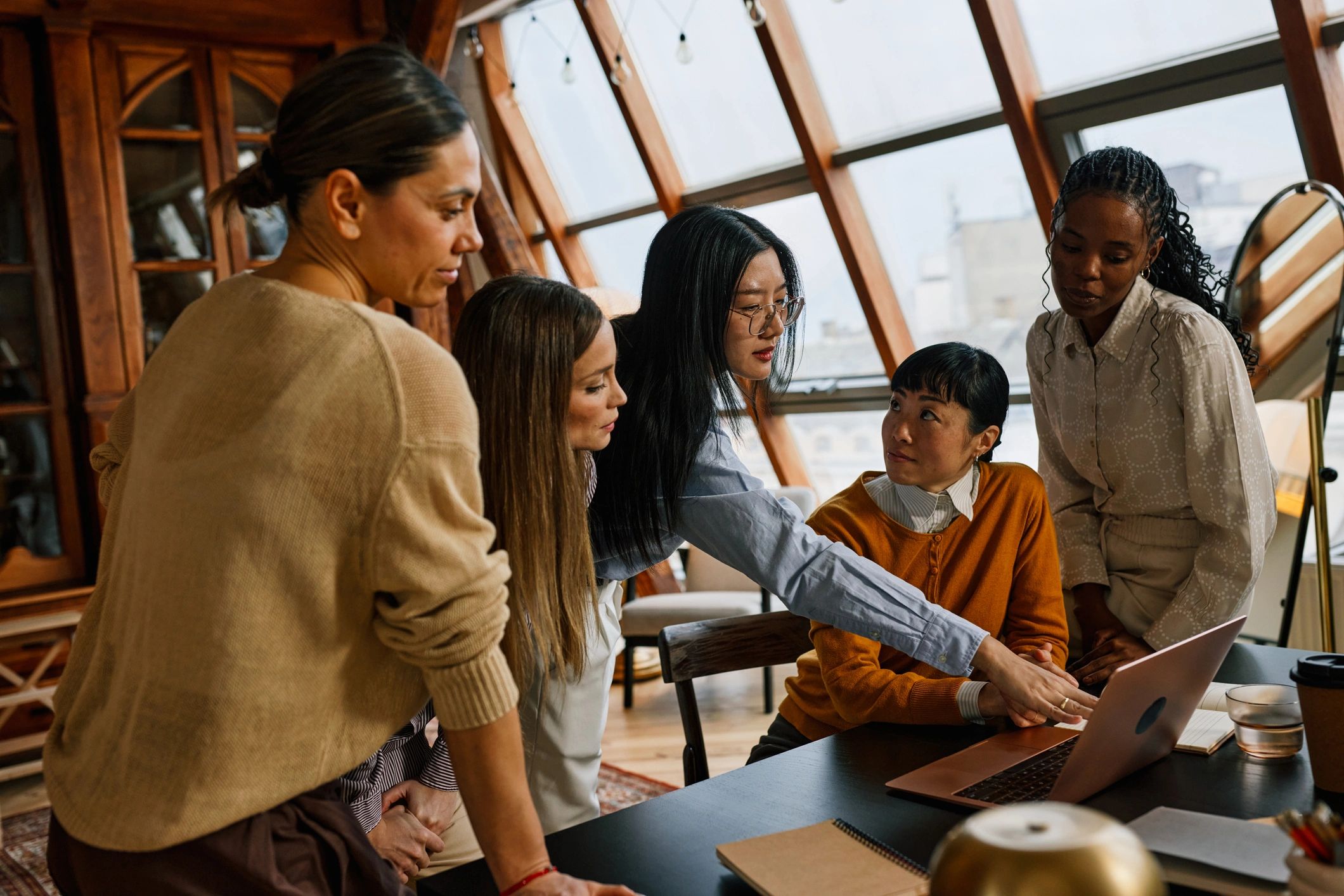 Small business team collaborating in a warm office